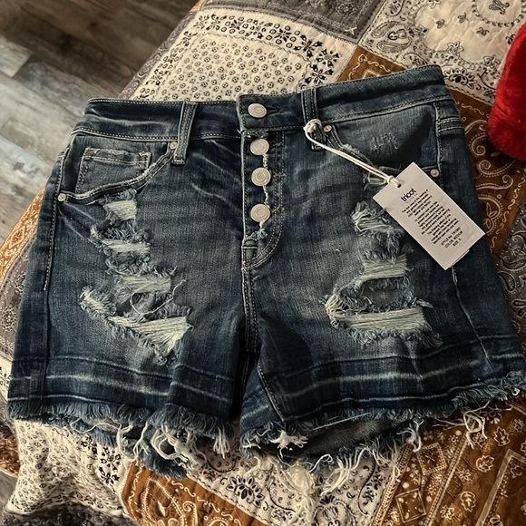 Distressed denim shorts - Picture 3 of 10